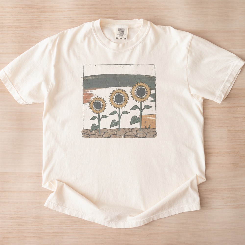 Three Sunflowers Rising from Cracked Earth Boho Tee